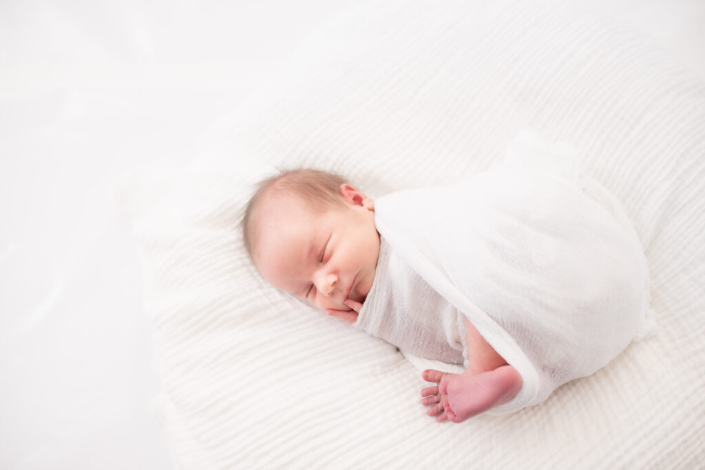 Newborn Baby Swaddled for a Studio Session